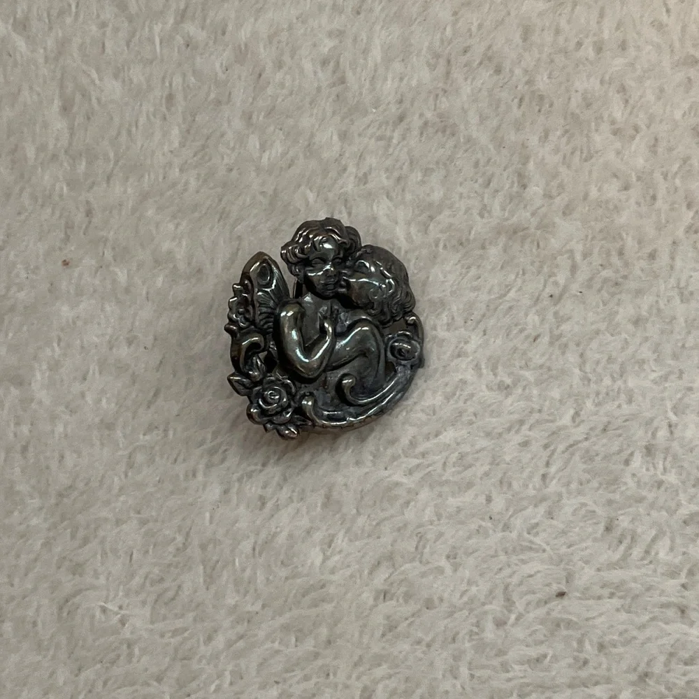 Elegant Silver Cherub Brooch